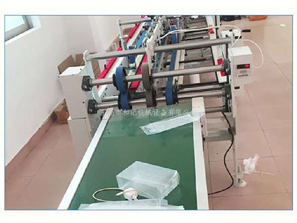 PVC膠盒折(she)邊機